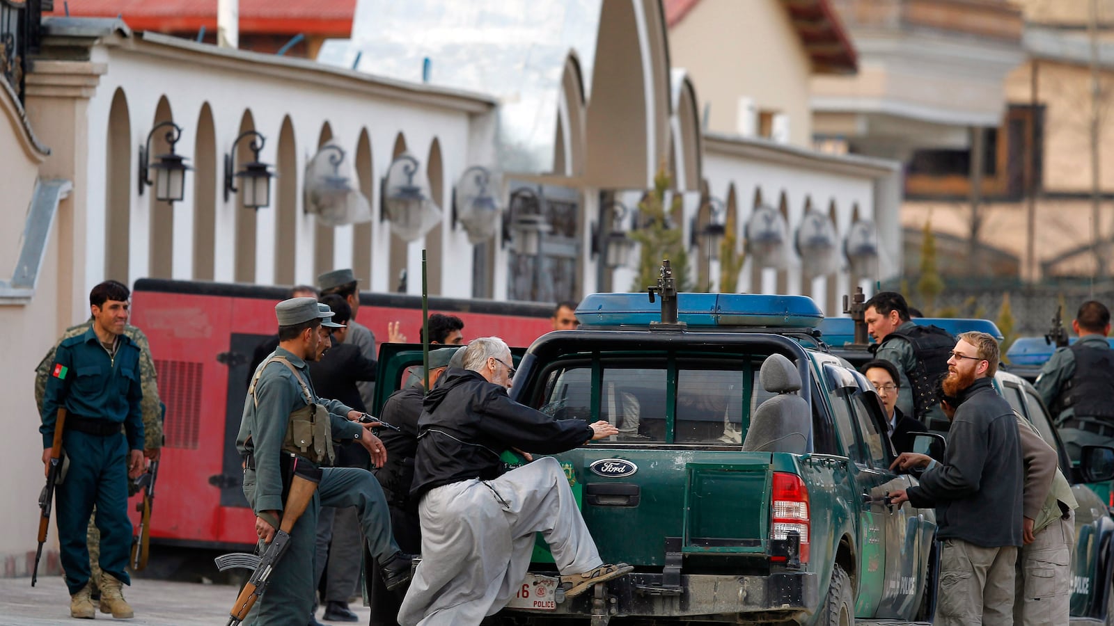 galleries/2014/03/28/taliban-attacks-guest-house-in-kabul-photos/140328-kabul-attack2_z2ndun
