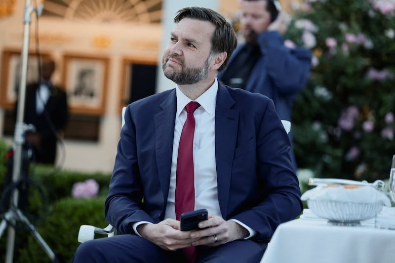 U.S. Vice President JD Vance listens to U.S. President Donald Trump deliver remarks during Trump's second 'Rose Garden Club' dinner in honour of Police Week at the White House in Washington, D.C., U.S., May 11, 2026. REUTERS/Evelyn Hockstein