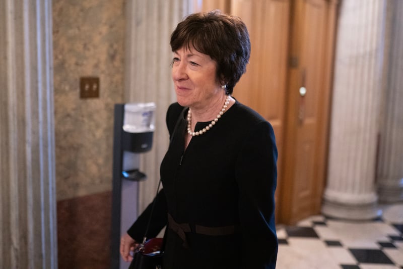 Sen. Susan Collins walks toward the Senate Chambers on March 22, 2024 in Washington, DC.
