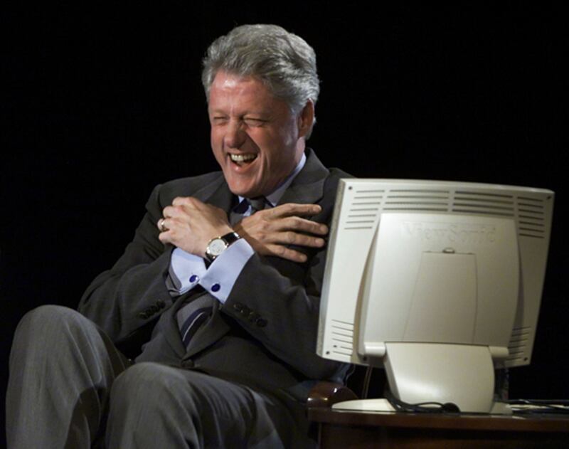 galleries/2012/05/25/bill-clinton-poses-with-porn-stars-more-awkward-photos/bill-clinton-awkward-photos-giggling_oilkfd