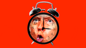 Donald Trump's face on an alarm clock showing 3:00, that is shaking back and forth