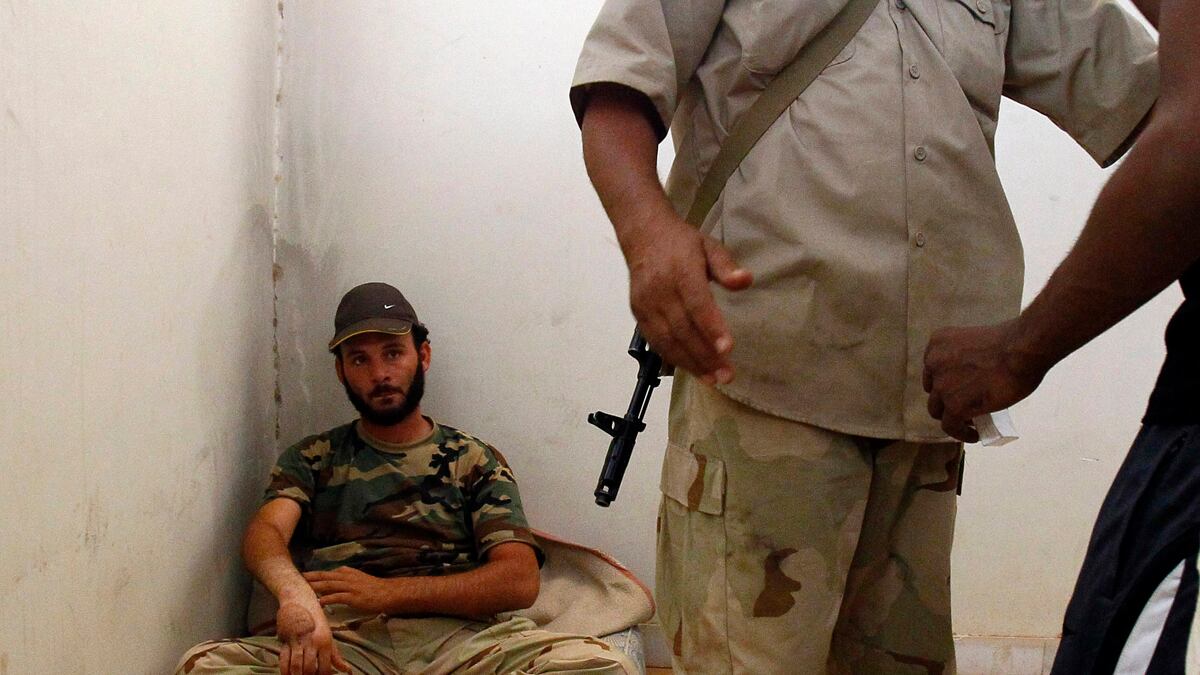 cheats/2012/01/26/group-libyans-tortured-to-death/libya-detainees-tortured-to-death-cs_zbfh3h