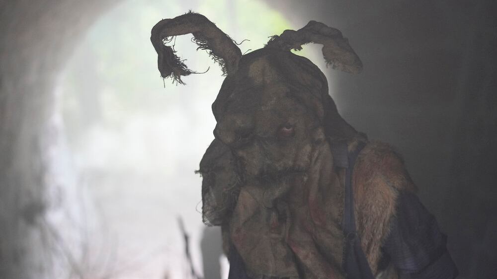 A photo still from 'John Carpenter's Suburban Screams'