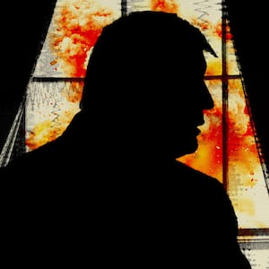 Silhouette of Donald Trump in front of bomb cloud