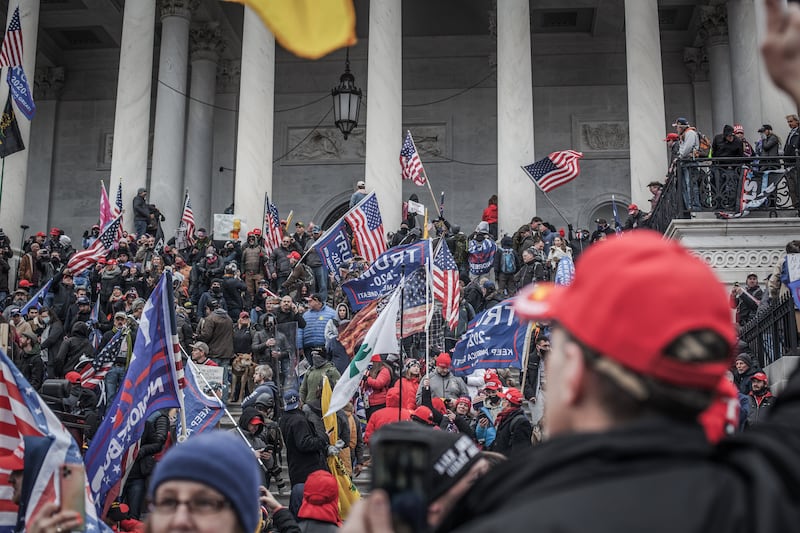 , breaking windows and clashing with police. Trump supporters had gathered in the nation's capital today to protest the ratification of President-elect Joe Biden's Electoral College victory over President Trump in the 2020 election. (Photo by Shay Horse/NurPhoto via Getty Images)