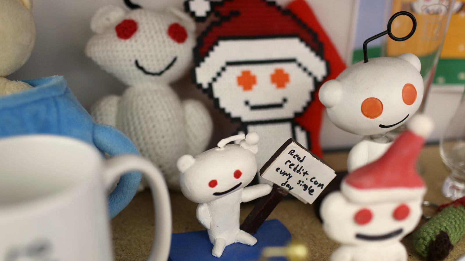 Reddit mascots are displayed at the company's headquarters in San Francisco.
