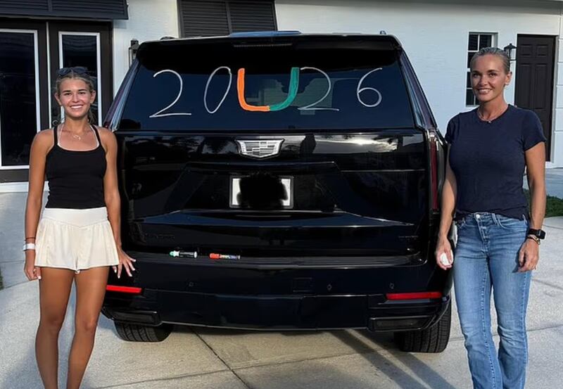 Kai Trump, 17, poses with a Cadillac Escalade and her mother, Vanessa Trump, who is 47.