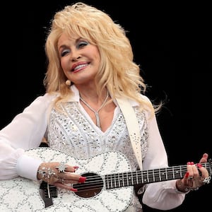 American country music star Dolly Parton performs on the Pyramid Stage at Worthy Farm in Somerset, during the Glastonbury Festival on June 29, 2014.