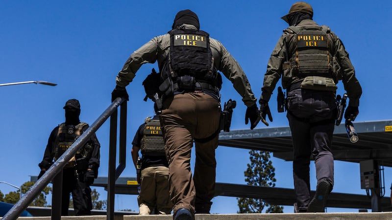 Immigration and Customs Enforcement agents walk outside the Ventura County Government Center in Ventura, California, on July 27, 2026.