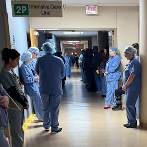 Alex Pretti's colleagues hold a moment a moment of silence at Minneapolis VA Health Care System hospital, in Minneapolis, Minnesota.