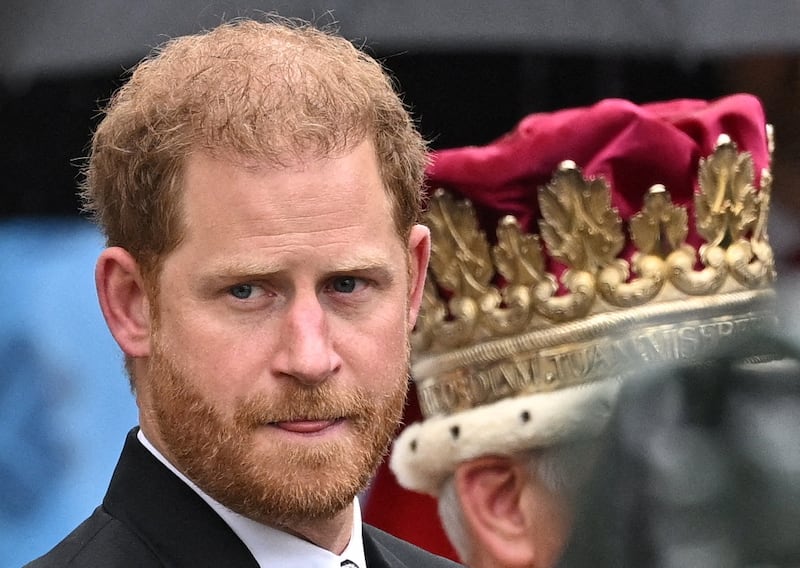 Prince Harry walks outside Westminster Abbey following Britain's King Charles' coronation ceremony, in London, Britain May 6, 2023.