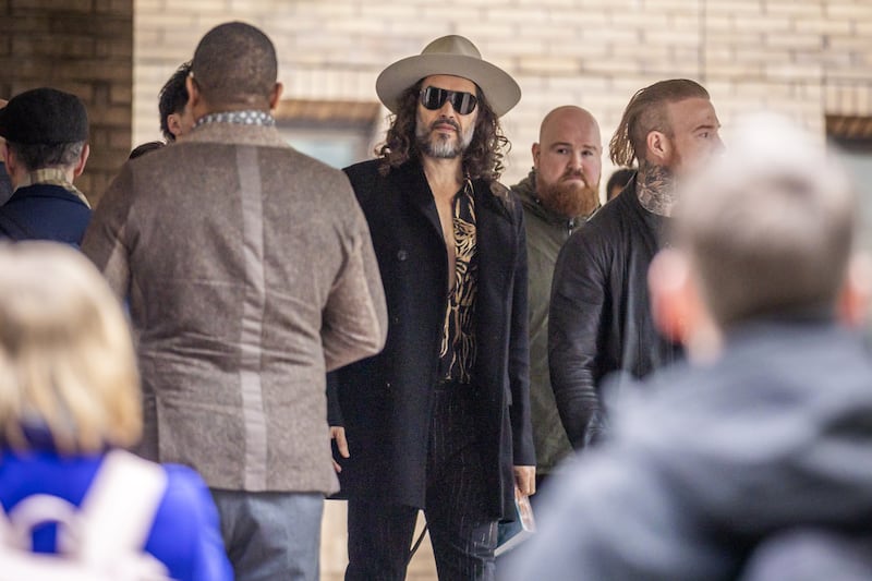 Russell Brand leaves the Southwark Crown Court to appear for a plea hearing, where he is charged with rape and sexual assault against two women in 2009, in London, United Kingdom on February 24, 2026.