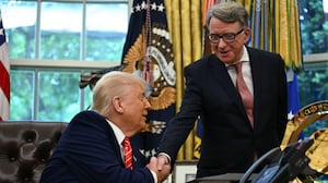 US President Donald Trump shakes hands with British ambassador to the United States Peter Mandelson after making a trade announcement in the Oval Office of the White House in Washington, DC, on May 8, 2025.