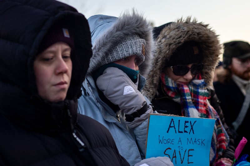 People pay their respects at a memorial site for Alex Pretti on January 25, 2026 in Minneapolis, Minnesota. Pretti was shot and killed by federal agents amid a scuffle to arrest him on January 24.