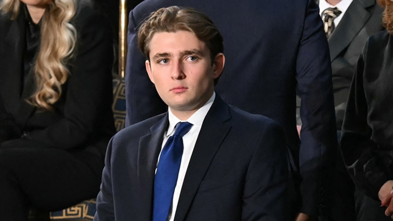 Barron Trump, son of US President Donald Trump, stands before the arrival of President Trump for the State of the Union address in the House Chamber of the US Capitol in Washington, DC, on February 24, 2026.