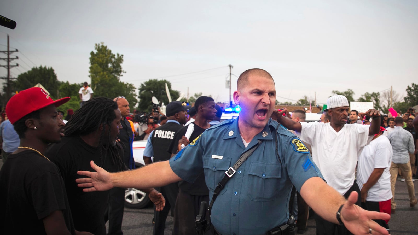 articles/2014/08/16/ferguson-shows-a-nation-at-war-with-itself/140815-martin-fergueson-tease_tyyrzt