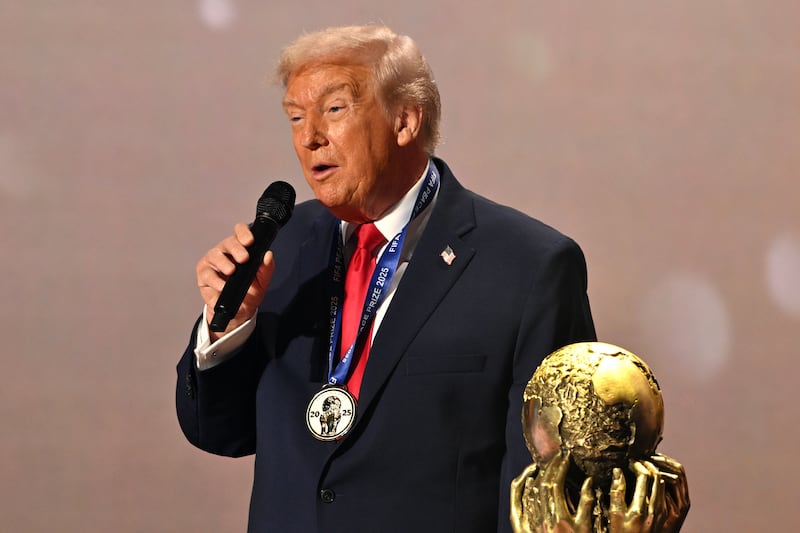 U.S. President Donald Trump speaks as he receives the FIFA Peace Prize.