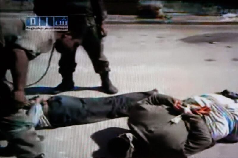 articles/2011/06/09/syria-s-immovable-forces-activists-and-assad-regime-dig-in-for-long-fight/syria-police-box_izaftc