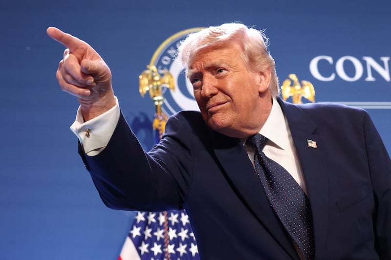 U.S. President Donald Trump gestures from the stage after delivering remarks to members of the Republican Party, at Trump National Doral Miami in Miami, Florida, U.S., March 9, 2026. REUTERS/Kevin Lamarque