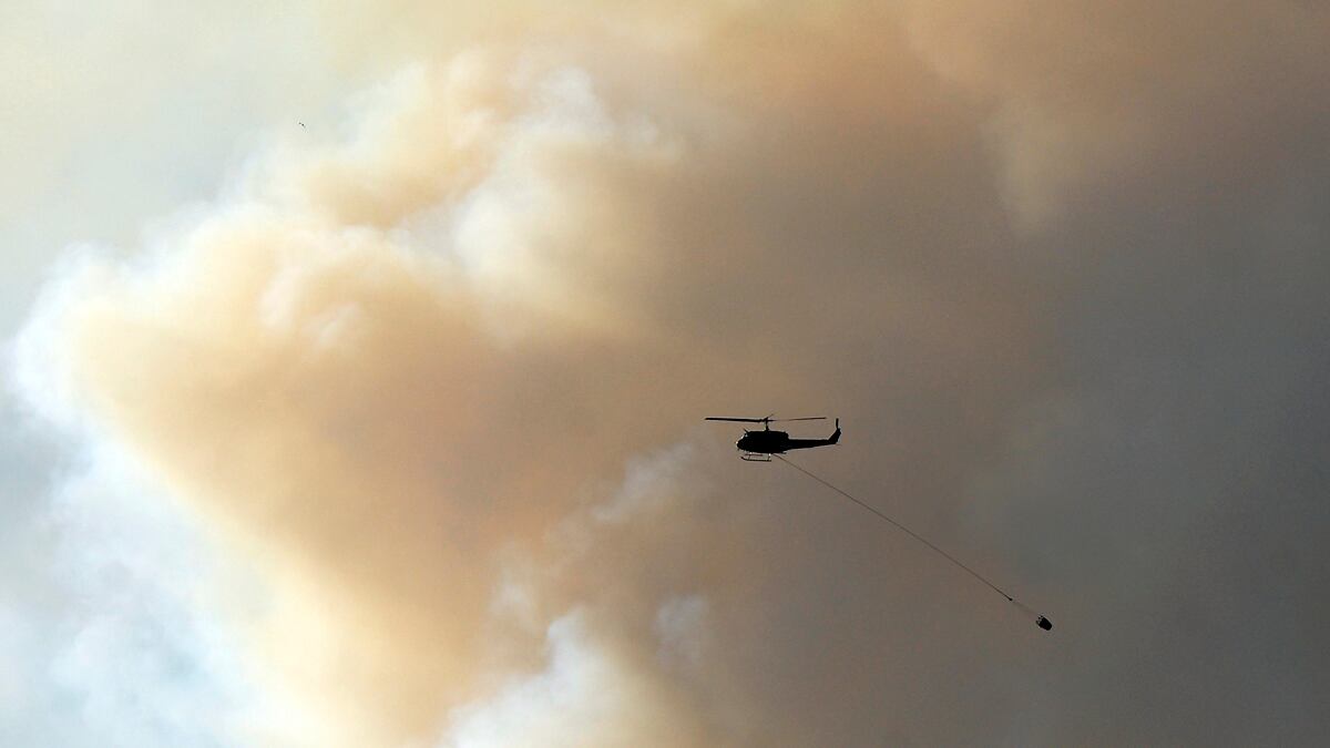 cheats/2012/06/25/colo-wildfire-burns-3-446-acres/co-wildfire-helicopters-cs_bzdr0y