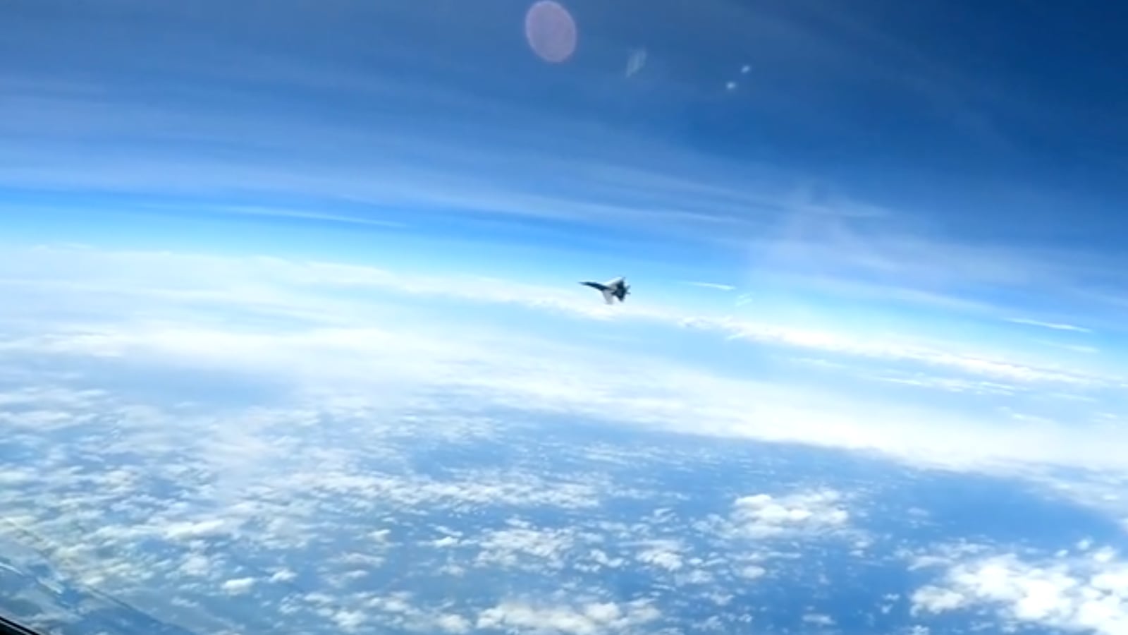 A Chinese fighter jet intercepting a U.S. RC-135 in the South China Sea.