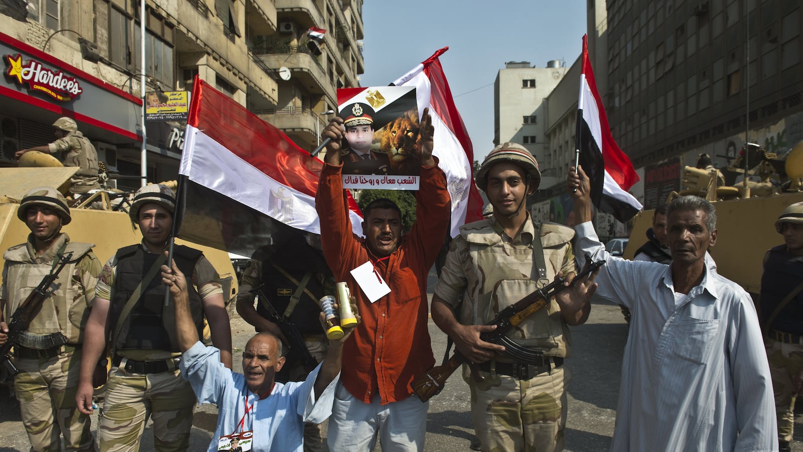 articles/2013/10/10/in-deeply-polarized-egypt-revolution-s-social-justice-slogans-are-seldom-heard/OZ_Cairo_October_6_fqmdnb