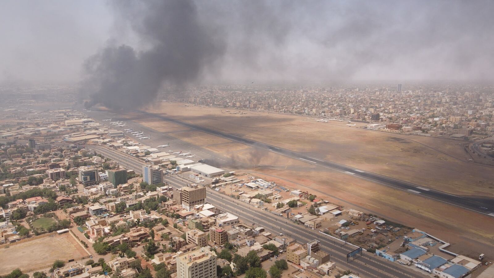 Smoke rises over the city as army and paramilitaries clash in power struggle, in Khartoum, Sudan, April 15, 2023.