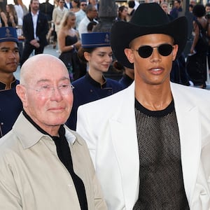 (From L) US producer David Geffen, Donovan Michaels, British model Lady Jemma Mornington and French businessman Arpad Busson poses during a photocall upon arrival to attend the Spring/Summer 2025 menswear ready to wear joint fashion show hosted by Vogue World as part of Paris Fashion Week at Place Vendome in Paris, on June 23, 2024, ahead of the upcoming Paris 2024 Olympic Games. (Photo by Geoffroy VAN DER HASSELT / AFP) (Photo by GEOFFROY VAN DER HASSELT/AFP via Getty Images)