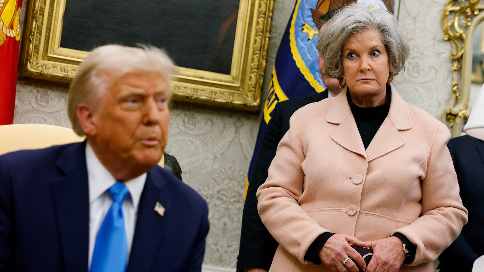 President Donald Trump, accompanied by White House Chief of Staff Susie Wiles (R), in the Oval Office of the White House on February 04, 2025 in Washington, DC.