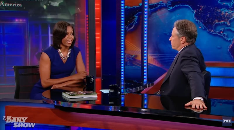 Michelle Obama appeared on "The Daily Show" in 2012 (above) and 2008.
