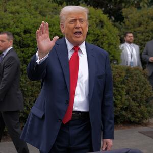 President Donald Trump waves to guests as he leaves the White House Easter Egg Roll on the South Lawn on April 21, 2025 in Washington, DC.