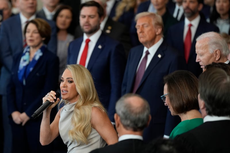 Carrie Underwood performs "America the Beautiful" as U.S. President Donald Trump and Vice President JD Vance listen
