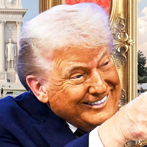 Donald Trump pointing at a rendering of the Arc de Trump triumphant arch in his honor