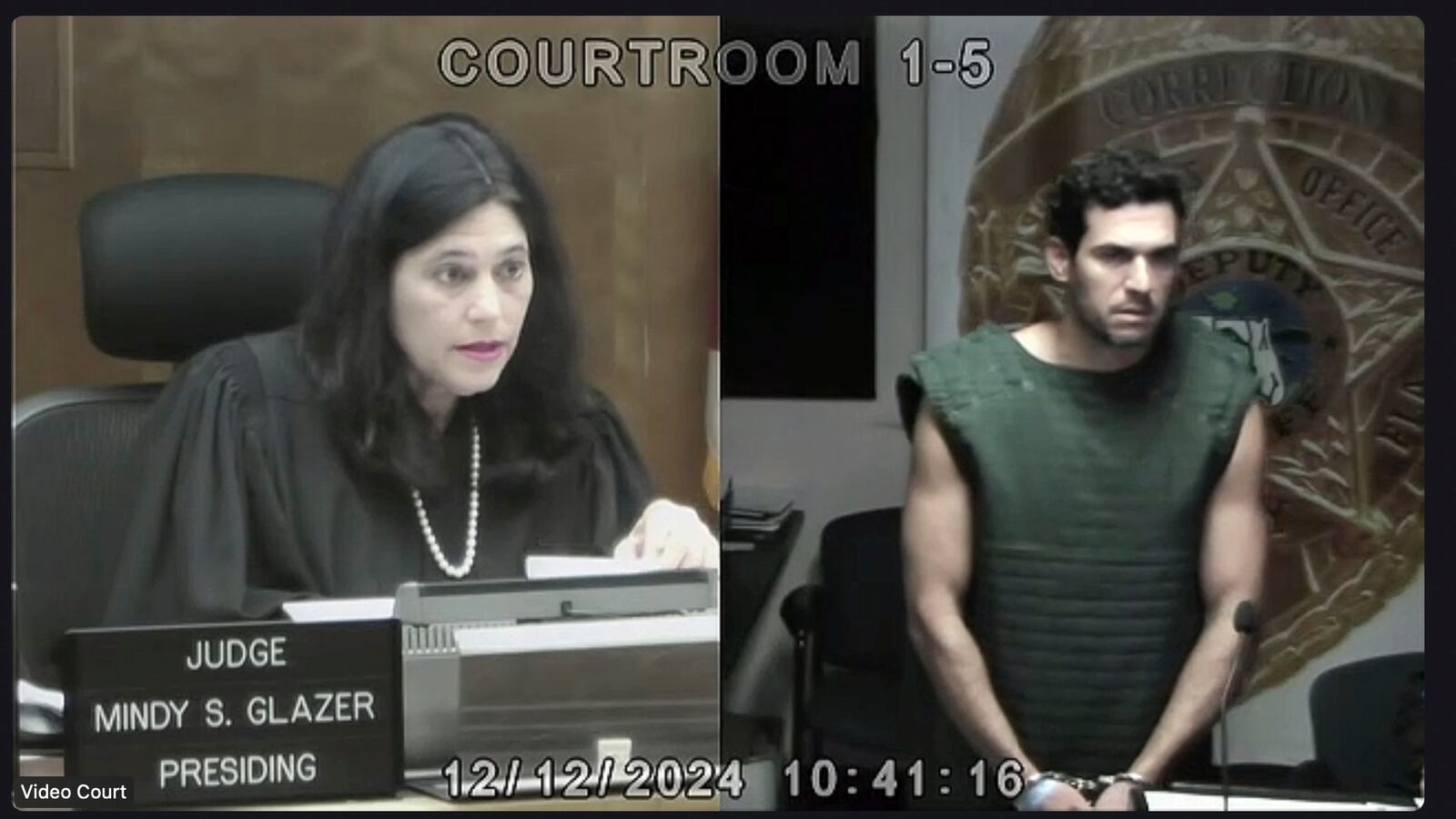 In this screenshot, Miami Dade Circuit Court Judge Mindy S. Glazer is seen via video presiding over the first court appearance of Oren Alexander, who is charged with sexual battery along with his twin brother, Alon Alexander, on Dec. 12, 2024, in Miami. (Miami Dade Circuit Court via AP, Pool)