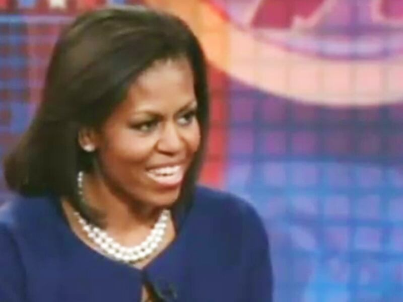 articles/2008/10/09/the-politics-of-michelle-obamas-hair/michelle-obama-on-daily-show_676_zs8vc2