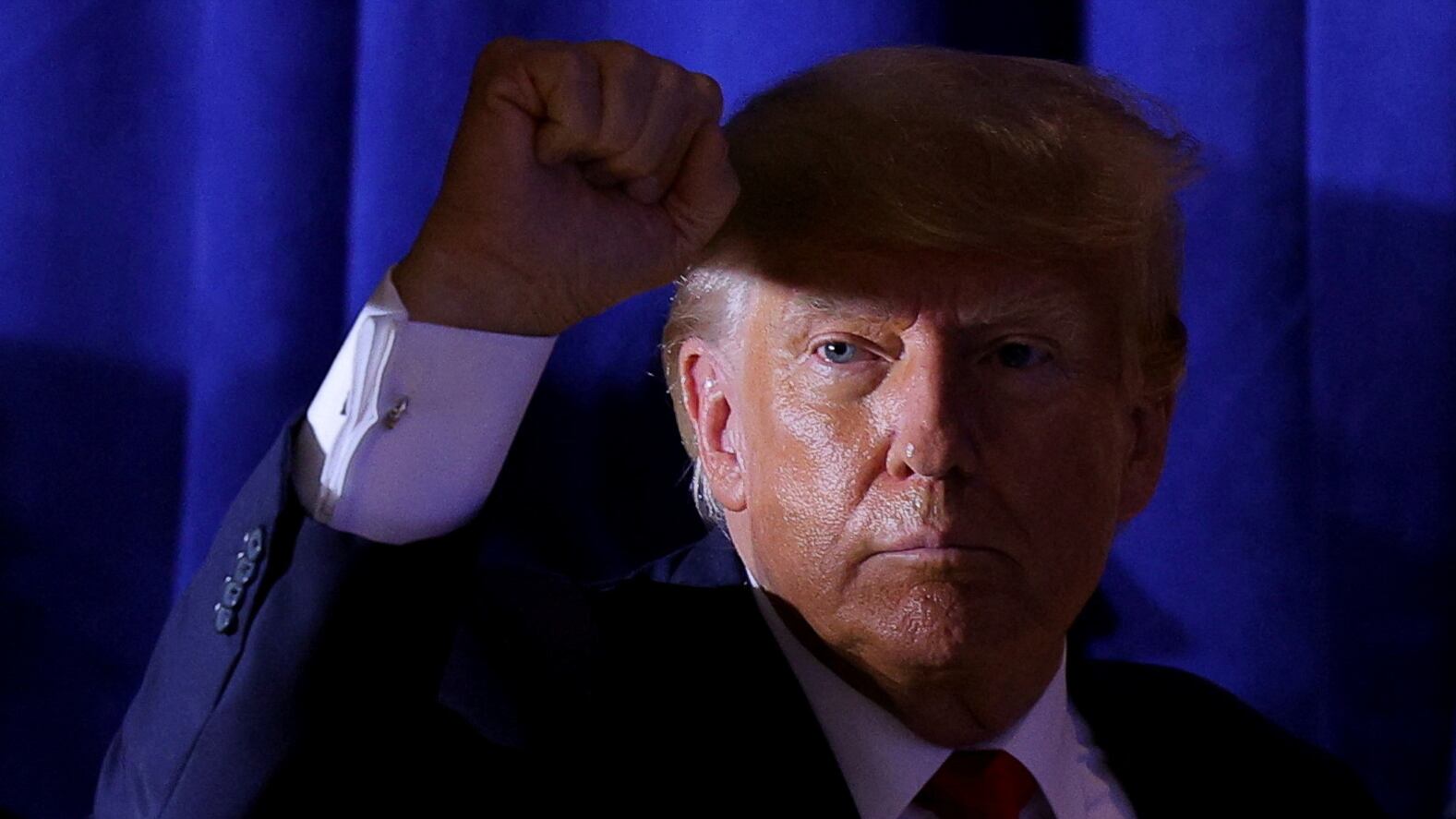 Former U.S. President and Republican presidential candidate Donald Trump gestures during a campaign event in Manchester, New Hampshire, U.S., April 27, 2023.