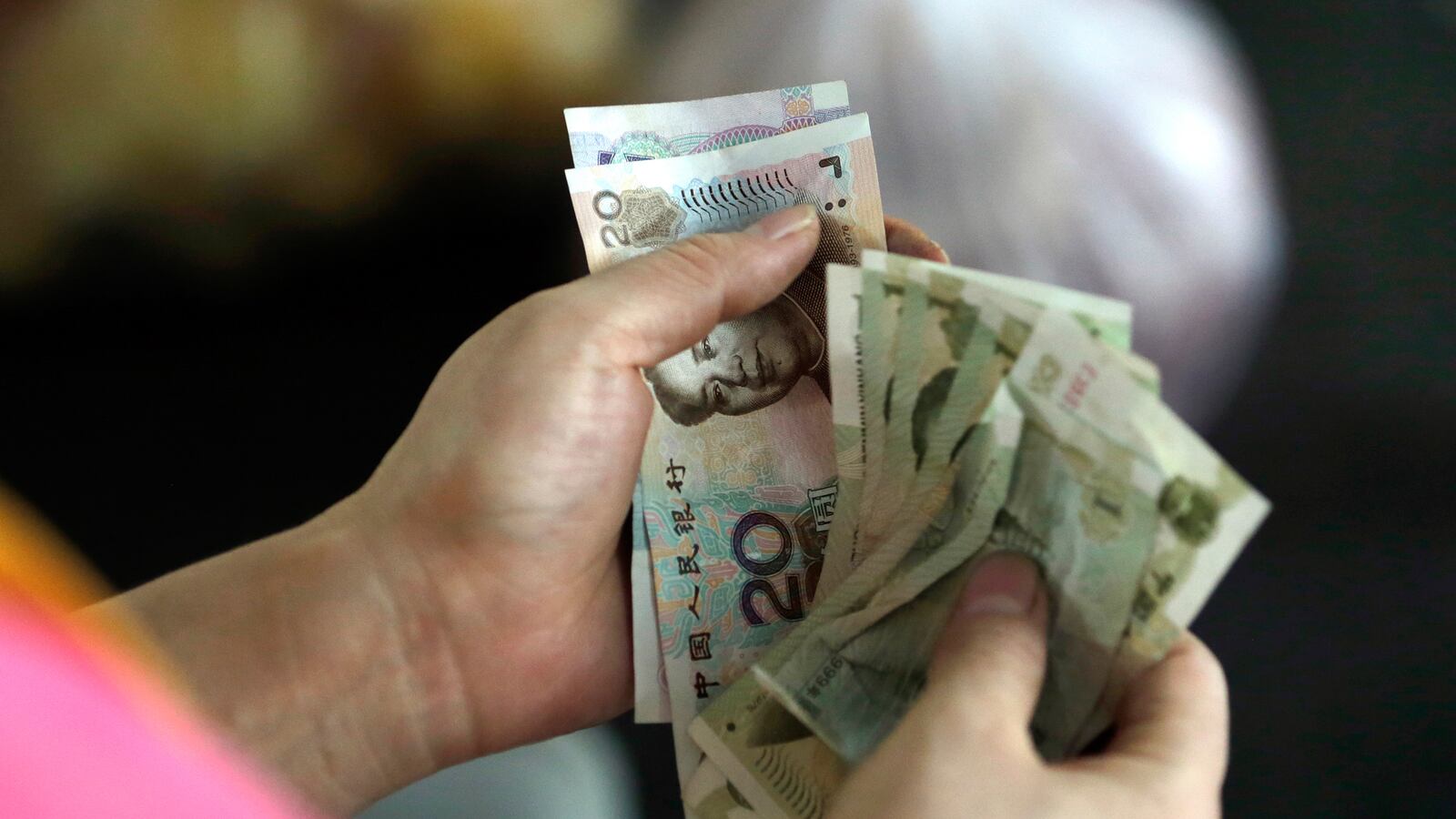 articles/2015/08/12/will-china-s-devaluation-suck-the-blood-out-of-u-s/150812-hong-china-currency-tease_m7qkyt