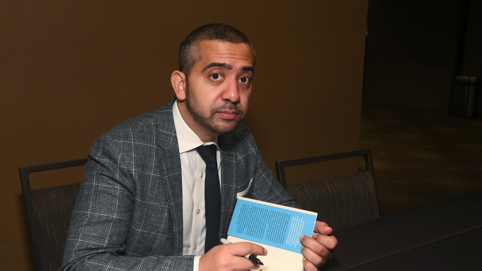 Mehdi Hasan as a book singing in California.