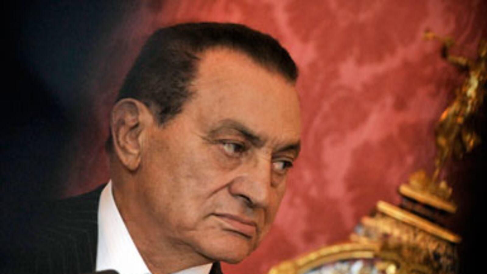 cheats/2011/07/17/mubarak-reportedly-in-coma/mubarak-plays-defense_j43whq