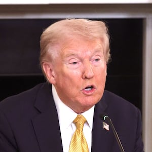 U.S. President Donald Trump, joined by Attorney General Pam Bondi