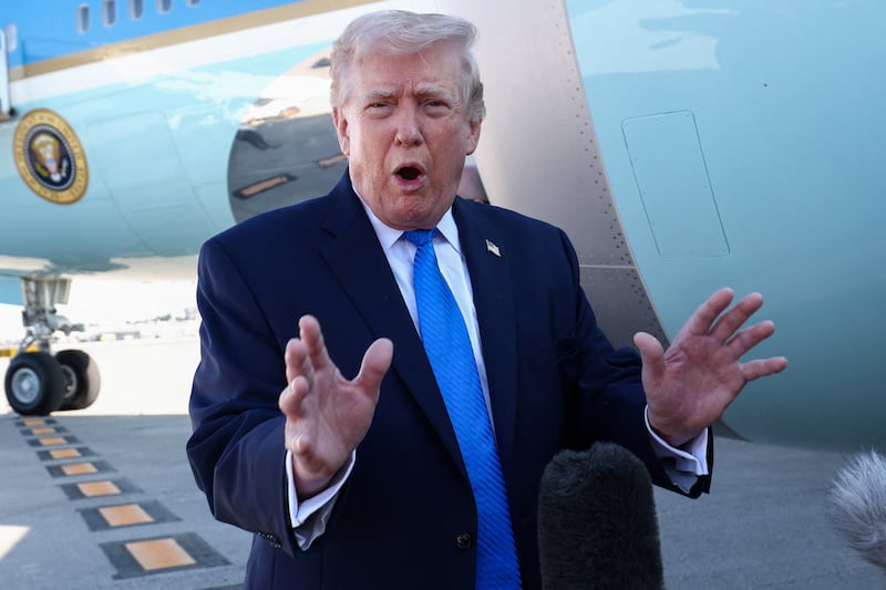 U.S. President Donald Trump speaks to the media before departing West Palm Beach aboard Air Force One, Florida, U.S., March 23, 2026.