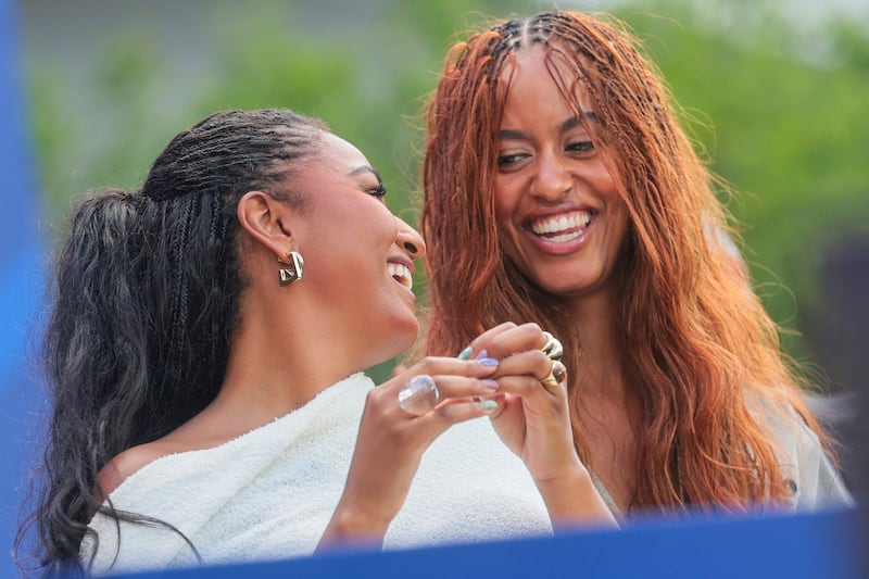 Malia and Sasha Obama sat next to each other at the ceremony and frequently laughed throughout it.