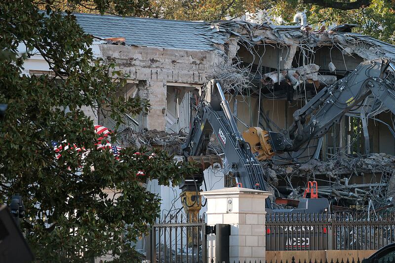 Workers demolish the facade of the East Wing of the White House on October 20, 2025 in Washington, DC. The demolition is part of U.S. President Donald Trump's plan to build a ballroom reportedly costing $250 million on the eastern side of the White House.