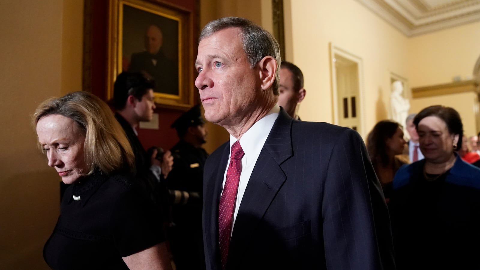 Jane Roberts (left) and John Roberts (right) depart the Capitol.