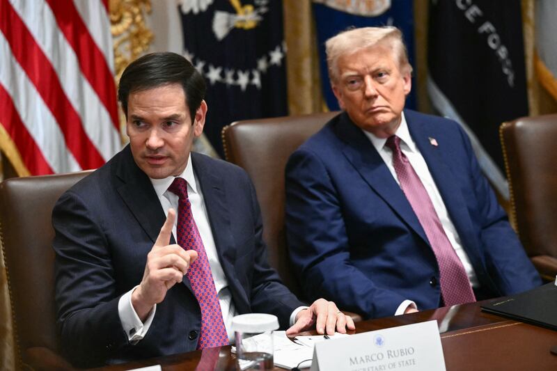 US President Donald Trump looks on as US Secretary of State Marco Rubio (L) speaks during a cabinet meeting in the Cabinet Room of the White House in Washington, DC, on August 26, 2025. (Photo by Mandel NGAN / AFP) (Photo by MANDEL NGAN/AFP via Getty Images)