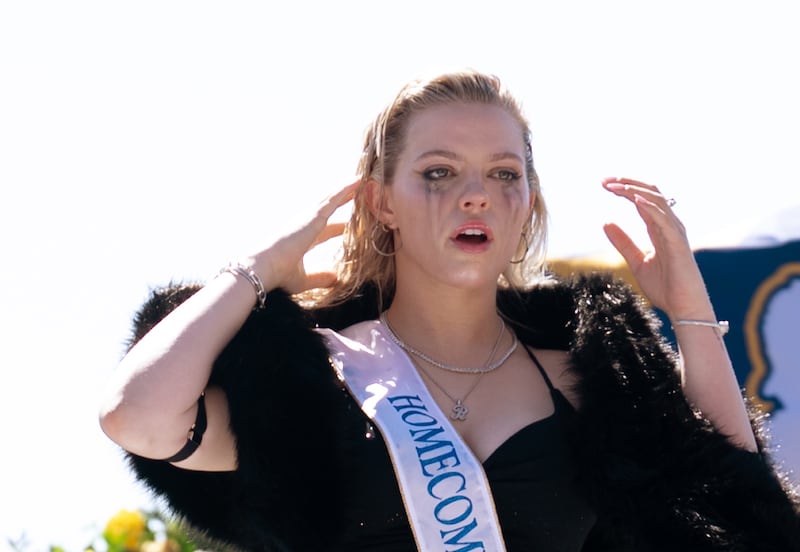 Christopher Briney plays Aaron Samuels and Renee Rapp plays Regina George in Mean Girls from Paramount Pictures.