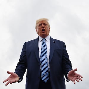 US President Donald Trump speaks to the press at Morristown Municipal Airport in Morristown, New Jersey, on August 13, 2019 as he departs for Pennsylvania where he will visit the Shell Pennsylvania Petrochemicals Complex. (Photo by Nicholas Kamm / AFP) (Photo credit should read NICHOLAS KAMM/AFP via Getty Images)