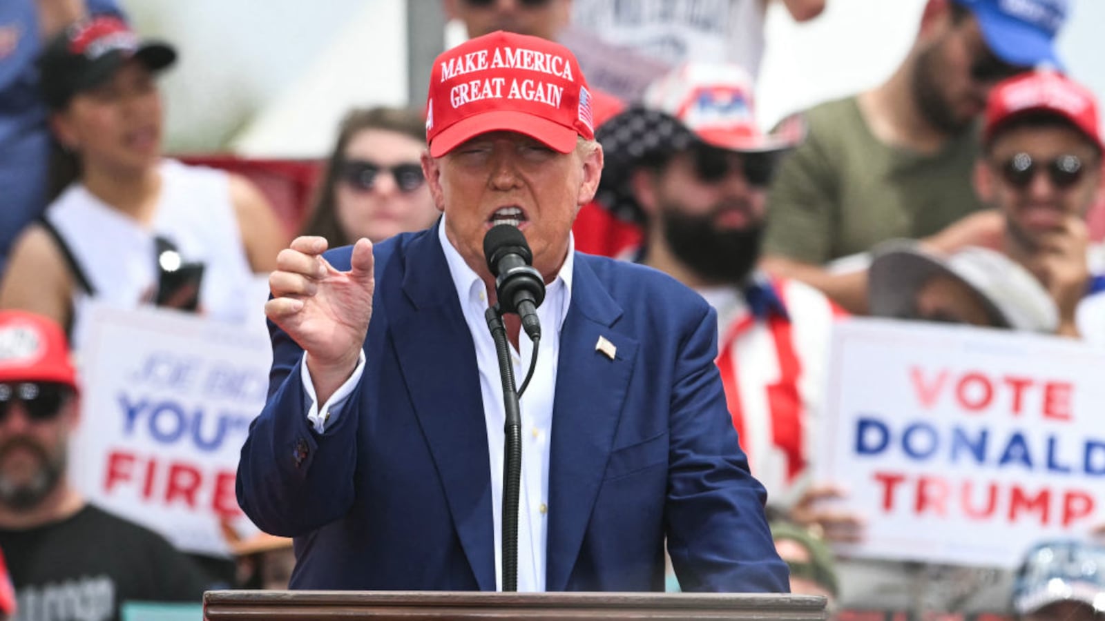 Former US President and Republican presidential candidate Donald Trump speaks during a campaign rally at Sunset Park in Las Vegas.