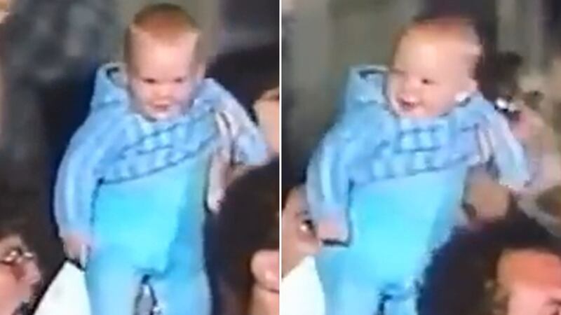 baby in crowd
