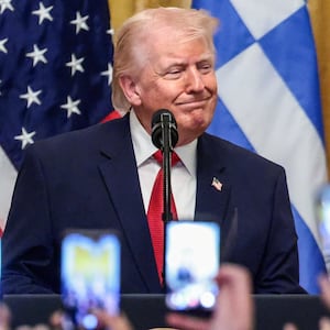 U.S. President Donald Trump attends a celebration in honor of Greek Independence Day in the East Room of the White House in Washington, D.C., U.S., March 26, 2026. REUTERS/Evelyn Hockstein